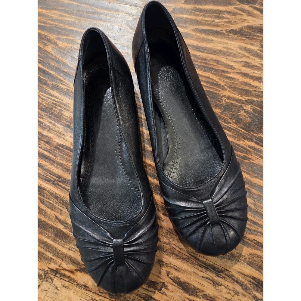 Clarks black slip on shoes-size 9.5 (7.5 UK)